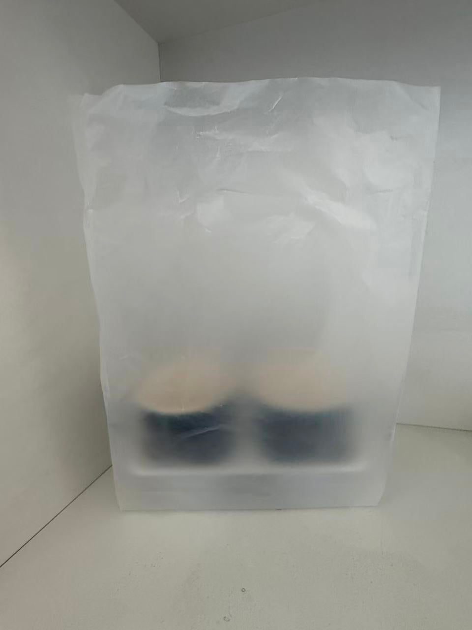 2 cup holder carrier disposable in plastic bag  (frontal view) 